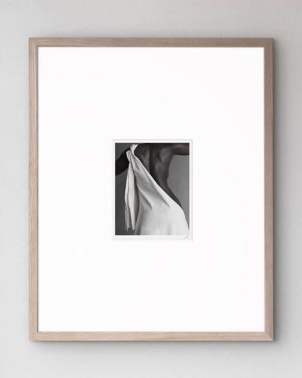 The artwork Figure mounted in our high-quality wooden frame in oak.