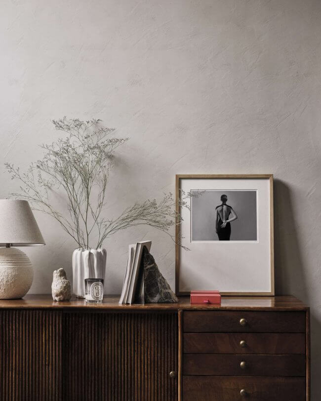 The fine art print self-portrait, by lisa olsson shown in an inspirational interior design setting.