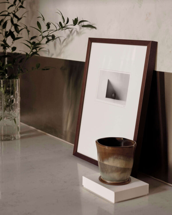 The Fine Art print Shadow, by Ragnar Ómarsson shown in an inspirational interior design setting.