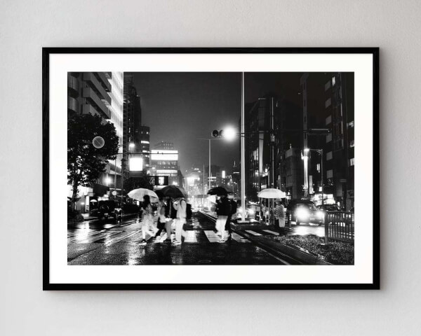 The artwork Tokyo By Night mounted in our high-quality wooden frame in black.
